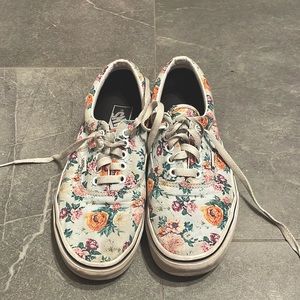 Low vans with colorful floral print.